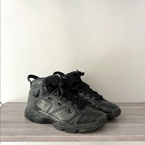 Black youth Nike sneakers
